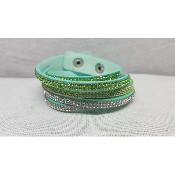 Textile bracelet with crystal type stones, green color